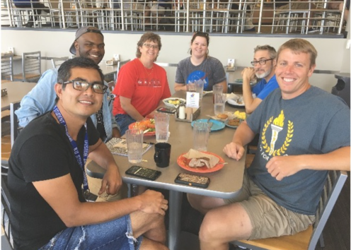 Group of RET members getting food together.